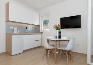 Eldhús eða eldhúskrókur á Seaview apartments Oscar