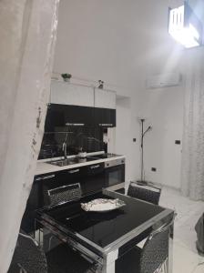 Kuchyňa alebo kuchynka v ubytovaní La casa di Titina