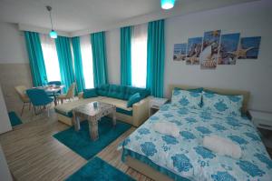Postel nebo postele na pokoji v ubytování Antonio Apartments