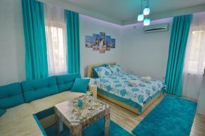 Postel nebo postele na pokoji v ubytování Antonio Apartments