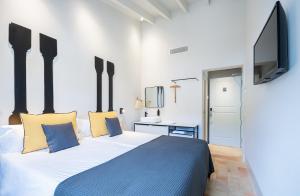 Posteľ alebo postele v izbe v ubytovaní Unic - Turisme d'interior