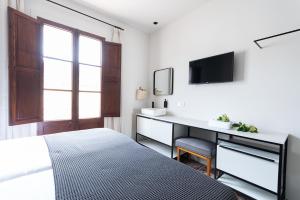 Posteľ alebo postele v izbe v ubytovaní "unic, turisme d'interior"