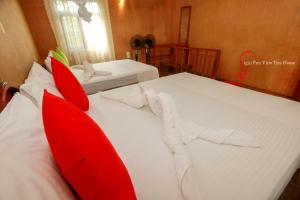 Letto o letti in una camera di Sigiriya Free View Tree House & Villa