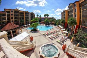 an overhead view of a pool at a resort at STUNNING CONDO NEAR UNIVERSAL STUDIOS in Orlando