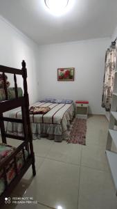 Ένα ή περισσότερα κρεβάτια σε δωμάτιο στο Casa Verde -temporada/Beto Carrero +27 φωτογραφίες