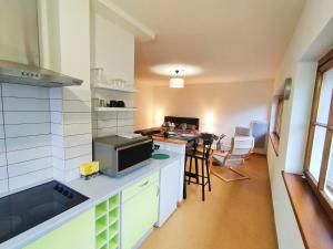 Kjøkken eller kjøkkenkrok på Lumineux Appartement Free Parking Nature Ville tt équipé
