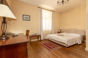 Postel nebo postele na pokoji v ubytování Hotel Slamič Ljubljana + 29 fotografií