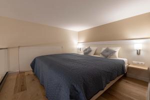 Posteľ alebo postele v izbe v ubytovaní Ozone One Apartment