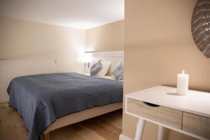 Posteľ alebo postele v izbe v ubytovaní Ozone One Apartment
