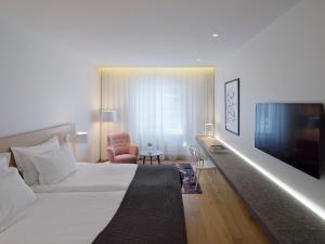 Letto o letti in una camera di PM & Vänner Hotel