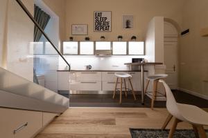 Kuchyňa alebo kuchynka v ubytovaní Ozone One Apartment