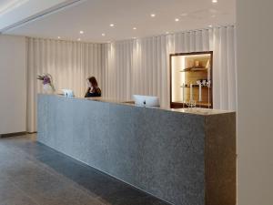 Lobbyn eller receptionsområdet på PM & Vänner Hotel