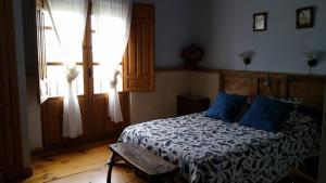 Posteľ alebo postele v izbe v ubytovaní El Camino Real