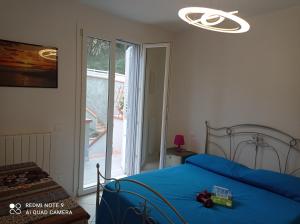 Llit o llits en una habitació de Vista sulle isole dell'arcipelago Toscano