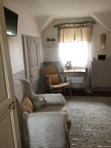 Posezení v ubytování Domaine "Les Bois Flottes" dans Maison de Charme au bord de mer et proche de Cabourg