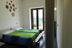Posteľ alebo postele v izbe v ubytovaní San Venanzo - Casale de Conti + 37 fotografií