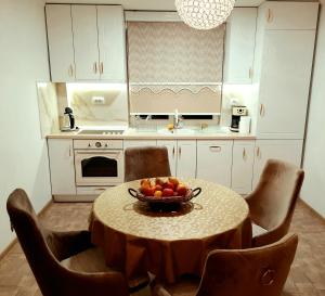 A kitchen or kitchenette at Lux Apartment ll Prijedor