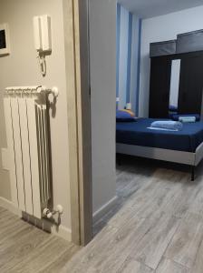 Кровать или кровати в номере Marolù Casa Vacanze