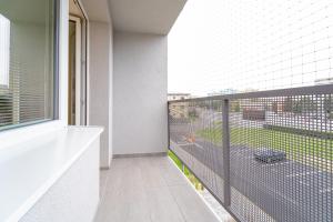 an empty balcony with a view of a street at 111Apartments in Košice