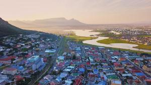 an aerial view of a city and a river at Admiralty Bed & Breakfast in Muizenberg +78 photos