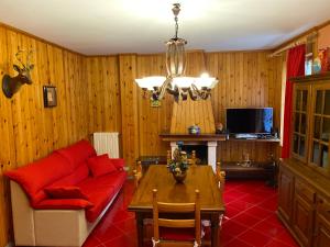 TV a/nebo společenská místnost v ubytování Residenza Miramonti