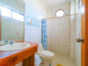 Vannituba majutusasutuses Gran Hostal Tintorera