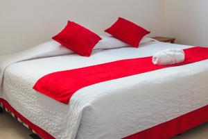 Voodi või voodid majutusasutuse Gran Hostal Tintorera toas