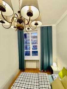 Posteľ alebo postele v izbe v ubytovaní ROYAL 2 Old Town fast WiFi Netflix HBO AppleTV+