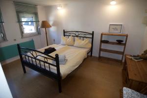 Postel nebo postele na pokoji v ubytování Modern Apartment Wissenbach 1