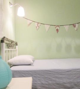 A bed or beds in a room at Polytropon Apartments