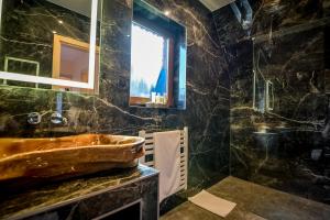 Kúpeľňa v ubytovaní Osada Małe Ciche DOMEK z Bali