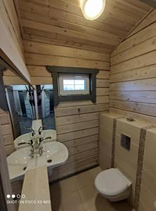 Ett badrum på Travel inn Villas