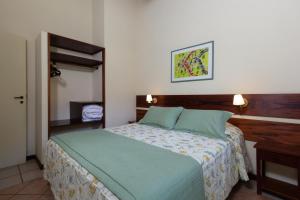 Postel nebo postele na pokoji v ubytování Villas De Paraty
