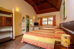 TV a/nebo společenská místnost v ubytování Villas De Paraty