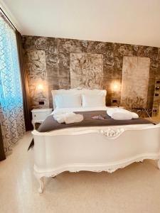 Posteľ alebo postele v izbe v ubytovaní Antica Pusterla Relais de Charme