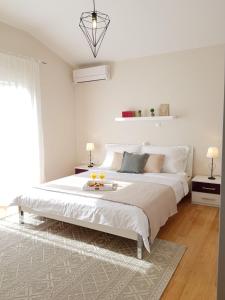 Posteľ alebo postele v izbe v ubytovaní Apartman marino