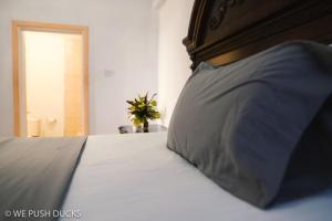 Krevet ili kreveti u jedinici u okviru objekta Belle View Apartment Villa - La Mar penthouse