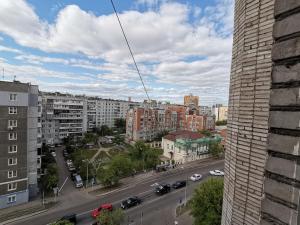 a view of a city with cars on a street at 2х комн квартира в Центре in Krasnoyarsk