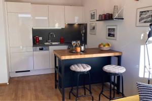 Kuchyň nebo kuchyňský kout v ubytování Apartment Hucklehaus
