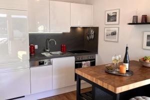 Kuchyň nebo kuchyňský kout v ubytování Apartment Hucklehaus