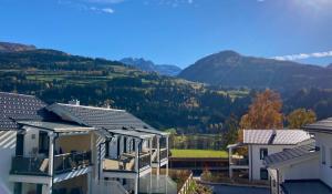 a view of the mountains from a house at Apartment Hucklehaus in Aich