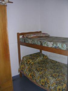 Una cama o camas cuchetas en una habitación  de Duplex 136 y 4