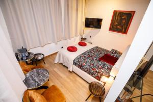 Postel nebo postele na pokoji v ubytování B&B Augusto