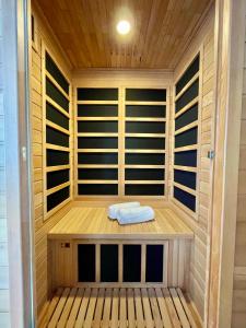 a sauna with a towel sitting in the middle at Libás Apartman in Keszthely