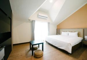 Postel nebo postele na pokoji v ubytování The Stay Inn