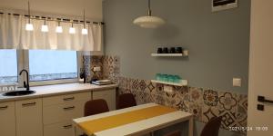 Kuchyň nebo kuchyňský kout v ubytování Apartman 3 + 3 fotografie