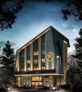a rendering of a building with a sign on it at Modern mountain - Crown apartment in Kolašin