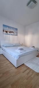 Ένα ή περισσότερα κρεβάτια σε δωμάτιο στο Apartments Cambellezza