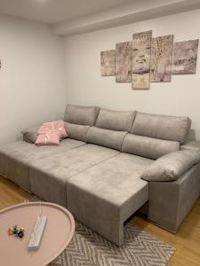a living room with a couch and a table at Vigo centro ciudad, con garaje in Vigo