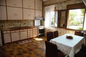 Kuchyňa alebo kuchynka v ubytovaní Hellenick House